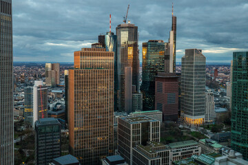 Wall Mural - Frankfurt is the only skyline in Germany. Backlight for sunset with a great sky and lighting in the houses. High-Rise Buildings, City Recording and Financing