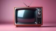 Old retro TV, vintage 50s television in pink color