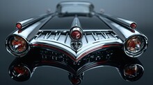 The Elegant Silhouette Of A Vintage Car's Hood Ornament, Embodying The Spirit Of Automotive Artistry And Craftsmanship.