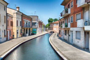 Canvas Print - Walking among the picturesque canals of Comacchio, Italy