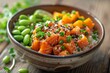 A colorful poke bowl featuring fresh salmon, mango, green onions, and sesame
