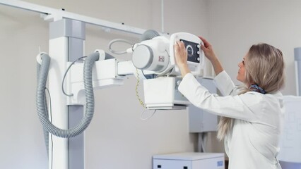 Sticker - A specialist radiologist doctor installs an x-ray scanner for a patient. Medical research, injury and treatment concept.