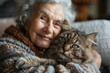 Elderly woman embracing dog with love, friendship between animal and senior, animal assisted therapy