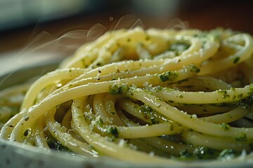 Steaming pasta entwined with pesto, on rustic tabletop, smoke wisps rising. Hot spaghetti ribbons with herbed dressing on wooden surface, vapors ascending gently.