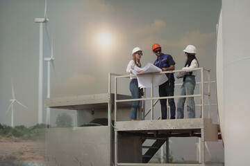 young man and woman maintenance engineer team. two engineer operate wind turbine. engineer and worke