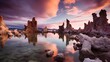 Colorful sunrise over the turrets of llama and tower rock formations at obscenely low water level in Champagne National Park Mono Lake,