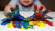 Colorful Hand Painting by Child on Table Surface