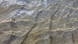 Fototapeta  - Water waves with sand bottom