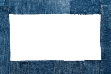 Wall Mural - Hole in denim on a white background. Ripped jeans
