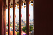 View of Bangkok, Thailand through window of Buddhist temple with bells