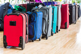 Fototapeta Nowy Jork - Row of travel bags in a tropical resort reception. Tourism, vacation and travel concept.