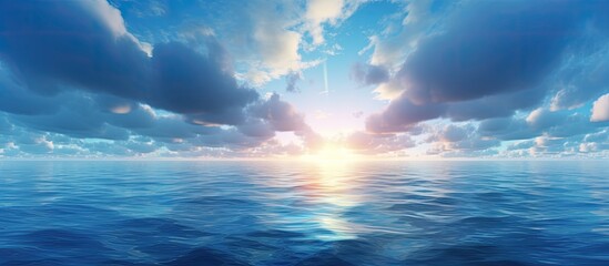 Wall Mural - the electric blue sky meets the horizon as the sun shines through the cumulus clouds over the liquid