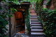 A staircase with a secret door leading to a rooftop garden