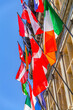 European countries flags on facade of Antwerp City Hall Stadhuis Antwerpen building in Antwerp city historical centre, vertical view, Flemish Region, Belgium