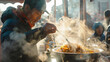 A food stall worker is enveloped in the mist of morning as he prepares a hearty, steaming dish, inviting the first rays of sunlight to dance through the steam.