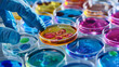 © MP Studio - Scientist Examining Bacterial Colonies in Petri Dish