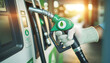 © mitarart - Fuel dispenser, green leaf symbol, symbolizing eco-friendly gasoline or biofuel options.