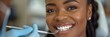 Dental appointment: Woman smiles during examination and cleaning