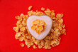 Heart with yogurt and sweetened corn flakes cereal