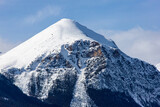Fototapeta Sport - Closeup of snowcapped Fairview Mountain as viewed from Morant's Curve near Lake Louise in Banff National Park, Alberta, Canada.