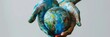 A striking image showing hands holding a globe, painted with blue and green resembling Earth, signifying environmental care