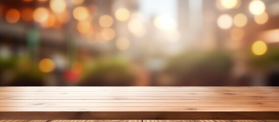 Poster - A hardwood table is in the foreground, with a blurred background of the sky and grass. The wood is stained with varnish, giving it a rich hue