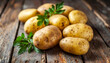 Fresh raw potatoes on weathered table, rustic charm, agricultural essence