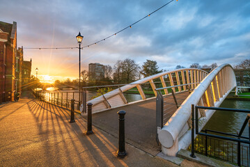 Sticker - Bedford riverside bridge on the Great Ouse river at sunrise. England