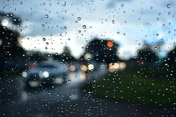 Wall Mural - raindrop on windshield, car drive in rainy day weather