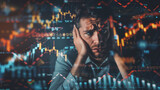 Fototapeta  - A man holds his head in despair while standing in front of a fluctuating stock chart, symbolizing financial stress and anxiety in the market, depressed stock market trader