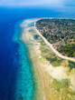 Aerial view of a coral reef wall surrounding a small tropical island (Gili Air, Indonesia)