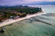 Aerial view of a beach resort on a small tropical island at sunset (Gili Air, Indonesia)