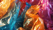 A bunch of crumpled disposable plastic bags of different colors, ecological conceptual background.