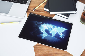Wall Mural - abstract graphic world map on modern digital tablet screen, connection and communication concept. to