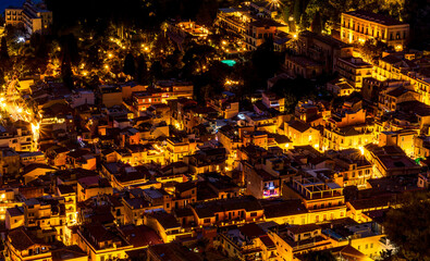 Wall Mural - Beautiful view of night town of Italy with colorful golden lights, night landscape on city of Europe