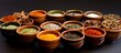 © AkuAku - A variety of spices are stored in bowls, essential ingredients for creating flavorful dishes in various cuisines. These plantbased seasonings enhance the art of cooking comfort food