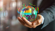 © Digital_Dreamer - Businessman Holding Globe with Financial Charts