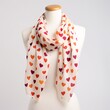 A heart-patterned scarf with stylish heart designs on a plain white background