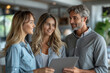 © Jelena - Real Estate Professionals Discussing Property Details