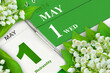 Green calendar 2024  May 1  Wednesday and flowers
