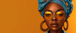 African woman with headscarf and yellow-tinted sunglasses.