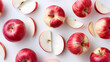 Red apple slices, white background,