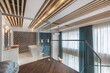 © alhim - The second floor of a modern penthouse with an original ceiling decor. The bathroom is .behind a glass partition.