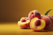 Peaches on a yellow background, close up.