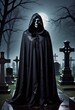 A scary figure in a black cloak, a ghost, in dark foggy cemetery. Halloween concept poster.
