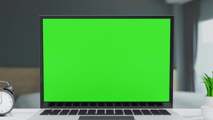 Wall Mural - laptop open to show green screen and zoom close up display in bedroom, application website presentat