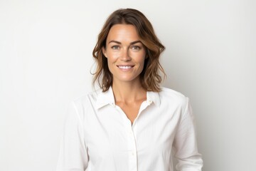 Wall Mural - Portrait of smiling businesswoman in white shirt. Isolated on white background.