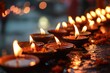 Reflecting Oneness: Traditional Diyas in Row for Hindu Ritual