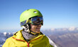 © nuclear_lily - Smiling Skier with Reflective Goggles and Helmet