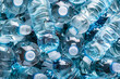 Discarded plastic bottles piled up waiting to be recycled. 